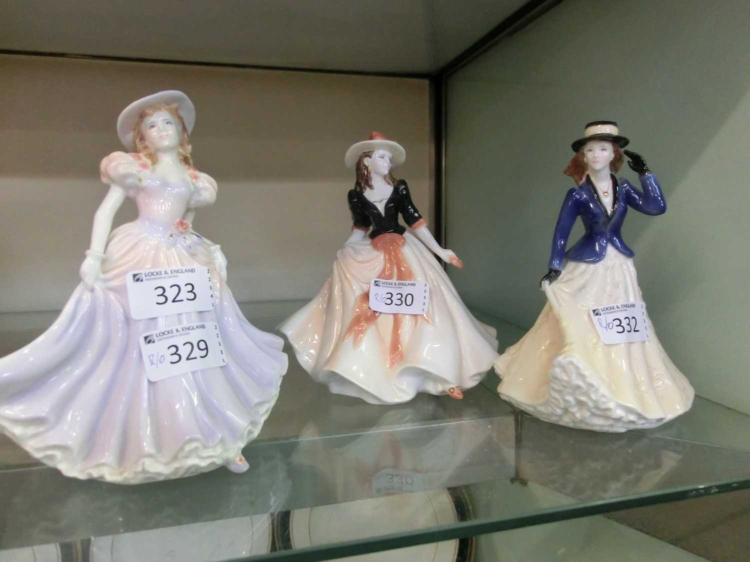 A Royal Worcester figurine 'Catherine' together with a Royal Worcester figurine 'Caroline' and a