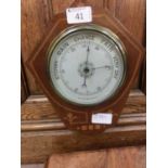 An early 20th century mahogany inlaid aneroid barometer