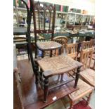A Victorian stained beech an cane seat child' chair and an oak and rush seat stool