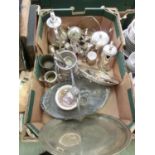 A box containing an assortment of silver plated ware to include teapot, tray, etc