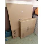 Two boxes of Icarus flatpack office furniture