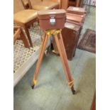 A surveyor's level in carrying case with tripod