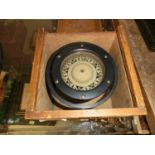 A gimbled military style compass in wooden box