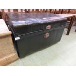 A painted lift-top trunk