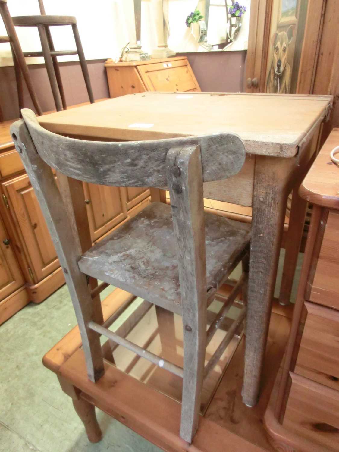 A beech lift-top school desk and chair