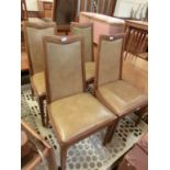 A set of four mahogany and Rexine seat mid-20th century dining chairs