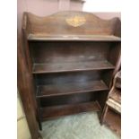 A set of early 20th century oak bookshelves