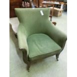 A 19th century armchair upholstered in green material on a painted mahogany frameSlight chips to