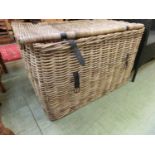 A cane laundry basketSome splits and minor damages to wicker. No damage to straps.
