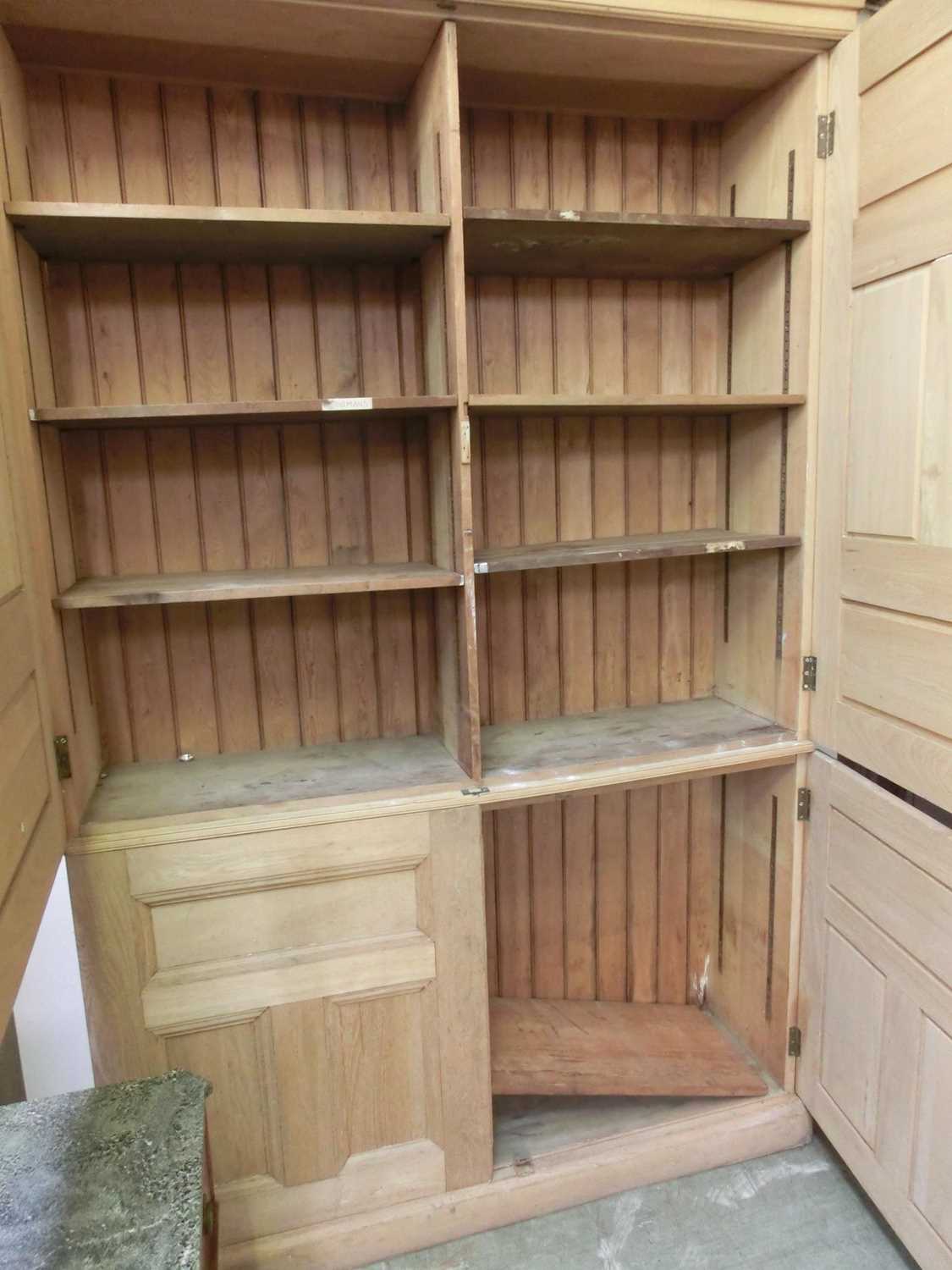 A very large early 20th century ash housekeeper's cupboardSplits to both top doors. Both top doors - Image 2 of 2