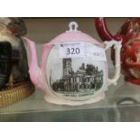 A ceramic teapot depicting Leamington Spa Town Hall