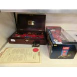 A case containing collector's cars together with a boxed 1998 Hotwheels Ferrari F300, etc