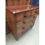 A Victorian mahogany chest of two short over three long drawers