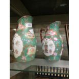 Two Chinese design porcelain jugs decorated with figures and auspicious objects