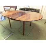 A Macintosh extending dining table