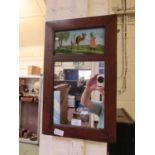 An early 20th century mahogany framed mirror with reverse glass panel depicting camel