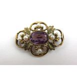 A 9ct gold, amethyst and pearl brooch of open work design. Approx. weight 8.2g