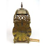 A late 17th century brass lantern clock by Thomas Power of Wellingborow (Wellingborough), the bell