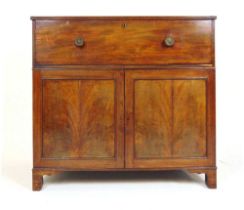 An 18th century mahogany secretaire cabinet, the top with presentation plaque over fitted secretaire