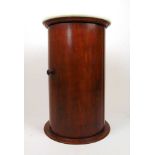 A Victorian mahogany cylindrical pot cupboard, the white marble top over single door, h. 69 cm, dia.