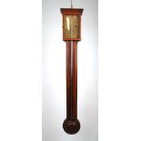 A 18th century mahogany and boxwood strung mercury stick barometer, the pediment over the paper