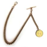 A 9ct rose gold graduating albert chain with 1887 double sovereign fob. Approx. weight 75g, l. 40