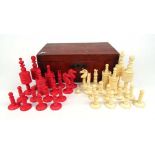 A 19th century turned bone chess set, in stained pine box, h.11 cmOne white bishop broken.