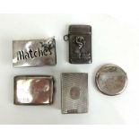 Three silver vesta cases together with a silver engine turned matchbox holder a novelty plated