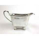 A George V silver Art Deco design cream jug. Hallmarked for Birmingham 1936, makers mark for Charles