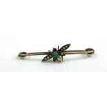 A late Victorian/early 20th century yellow metal, turquoise and seed pearl insect brooch marked '