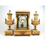 An early 20th century French pink veined alabaster and gilt metal clock garniture, the clock