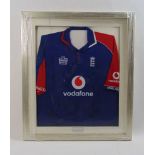 A 2007 England cricket shirt signed by the full squad, h. 94 cmGlass broken.