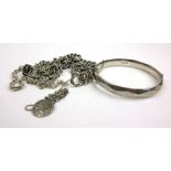 An assortment of silver jewellery to include a bangle, rope twist chains, ring etc. Approx. weight