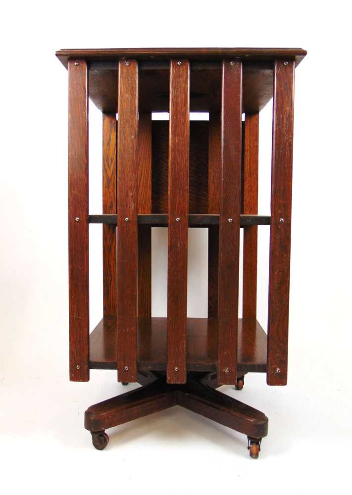 An early 20th century oak revolving bookcase, the top with presentation plaque and drop flap over - Bild 2 aus 4