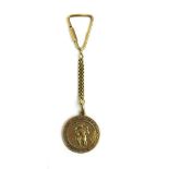 A yellow metal St Christophers medal on chain marked '750'. Approx weight 19gSt Christopher marked