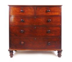 A 19th century mahogany chest of two short over three long drawers on turned feet, h. 118 cm, w. 124