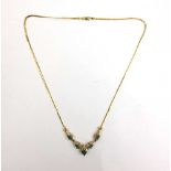 A 9ct gold, emerald and diamond necklace. Approx. weight 6.1g