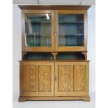 An early 20th century oak 'Country House' bookcase by Kingfisher Ltd. of West Bromwich, the