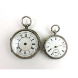 An Edwardian silver pocket watch together with a silver fob watch A/F