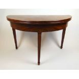 An 18th century mahogany demi-lune tea table, the fold over top supported on a single leg drawer