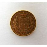 A Queen Victoria gold full sovereign dated 1872