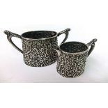 A silver cream jug and sugar bowl, hallmarked William Devenport, Birmingham,1898. Approx. weight