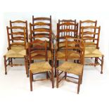 A harlequin set of ten (6+4) oak dining chairs with rush seat, incorporating a set of six