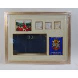 A framed display of the World Cup 1966 including a seat back from the Wembley stadium