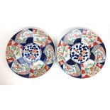 A pair of early 20th century Japanese imari chargers, dia. 39.5 cm