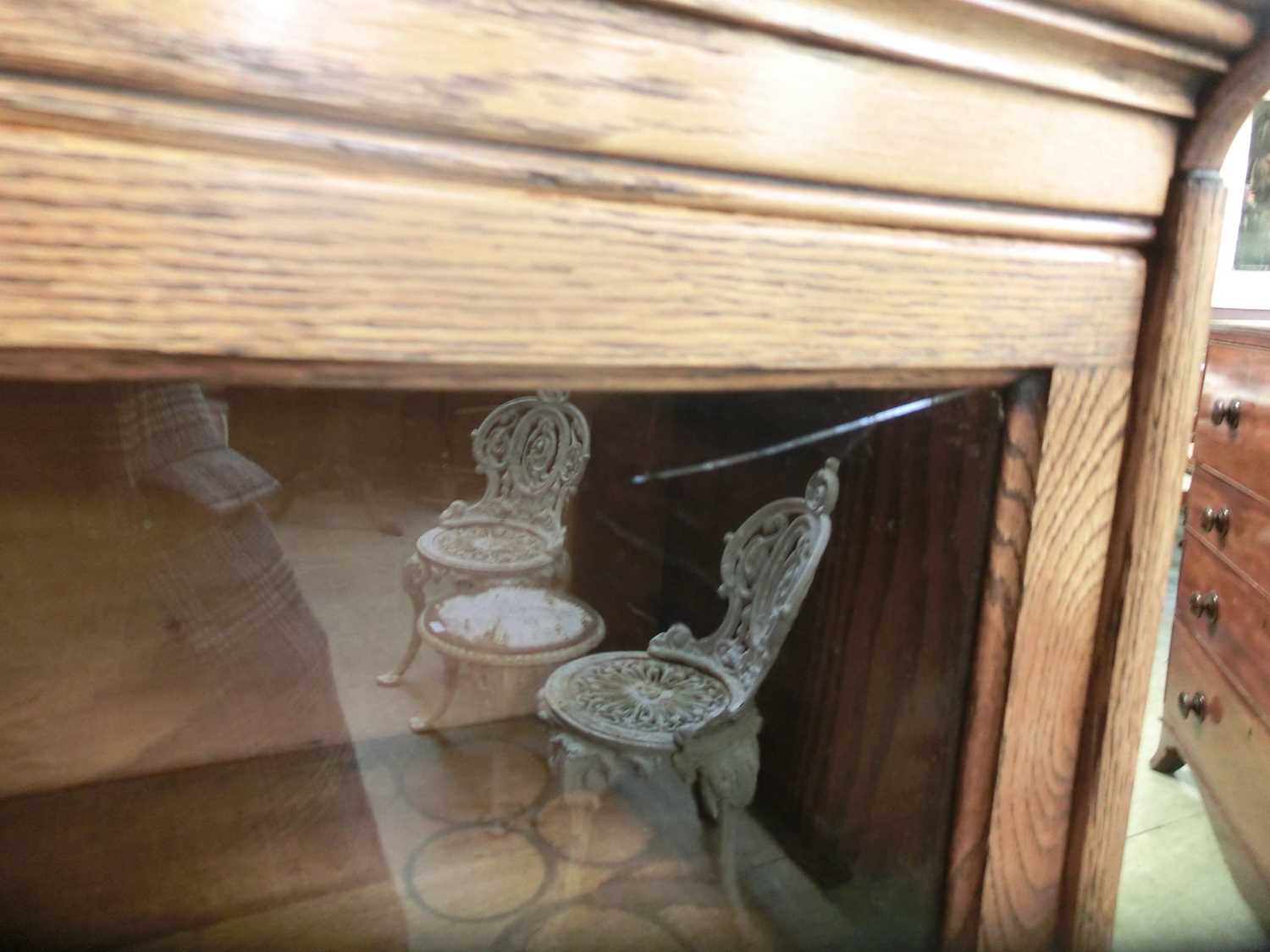 An early 20th century oak sectional bookcase by 'Gunn', the cornice over three glazed section and - Image 4 of 5