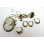 A selection of 9ct gold and yellow metal jewellery to include rings, cameo brooch, earrings etc.