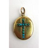 A Victorian yellow metal locket with turquoise set cross to front, l. 2.2 cm