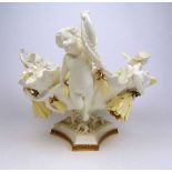 A 19th century Moore Bros. table center, three cupids surrounding the bowl on a naturalistic column,