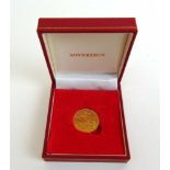 A Queen Elizabeth II gold full sovereign dated 1964. In presentation box.